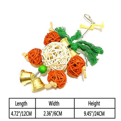 Parrot nibble toy with three orange woven balls, white ball, green tassels and gold bells on Tampa Home & Garden Store