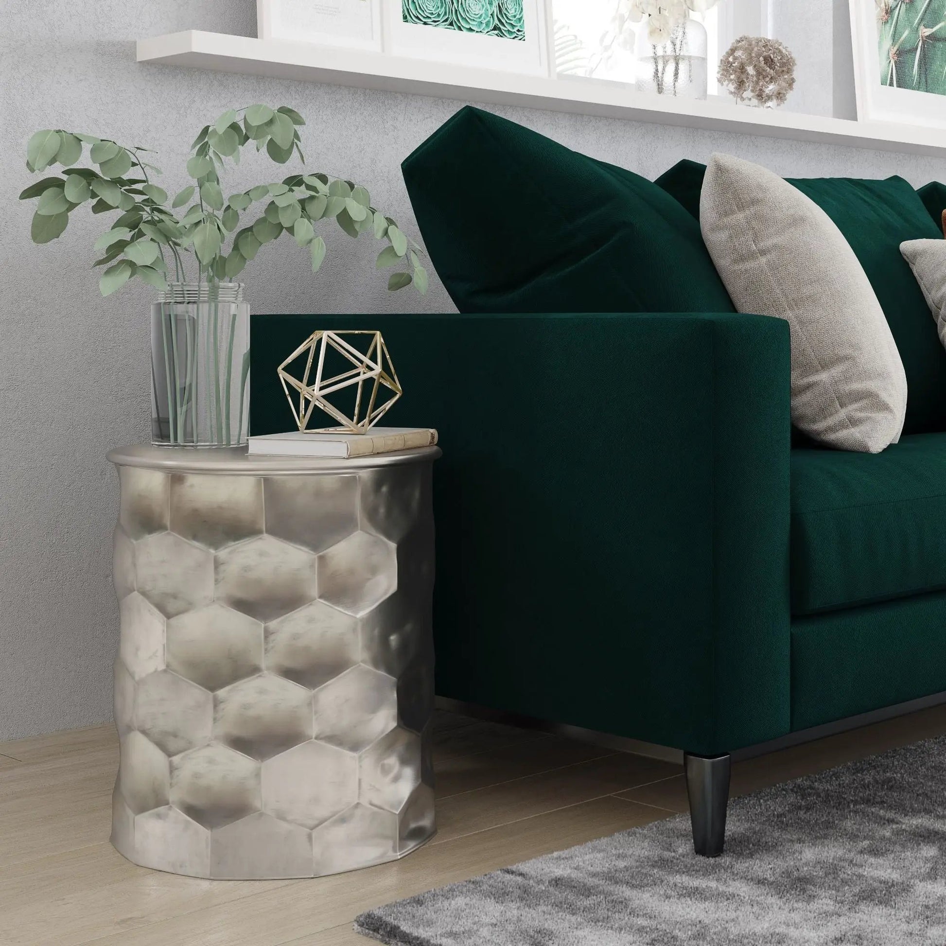 Whitney handcrafted metal storage table with hammered silver hex base beside a green sofa on Tampa Home & Garden Store
