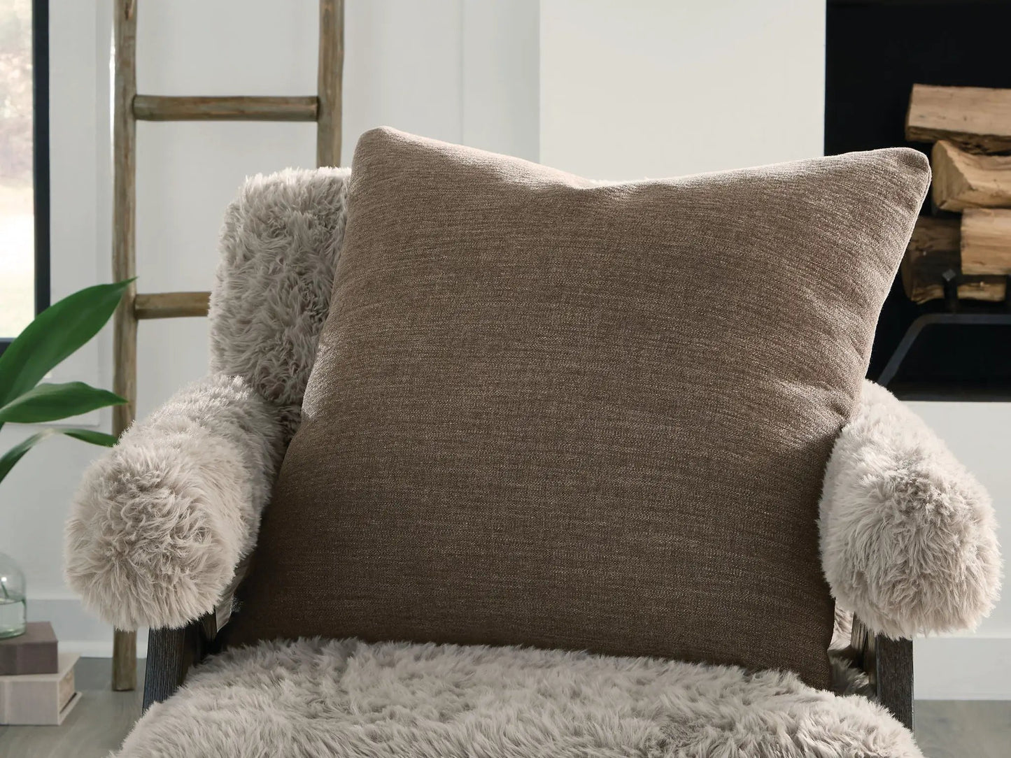 Brockbert pillow taupe woven fabric by Unique Piece Furniture shown with a fluffy beige throw on Tampa Home & Garden Store