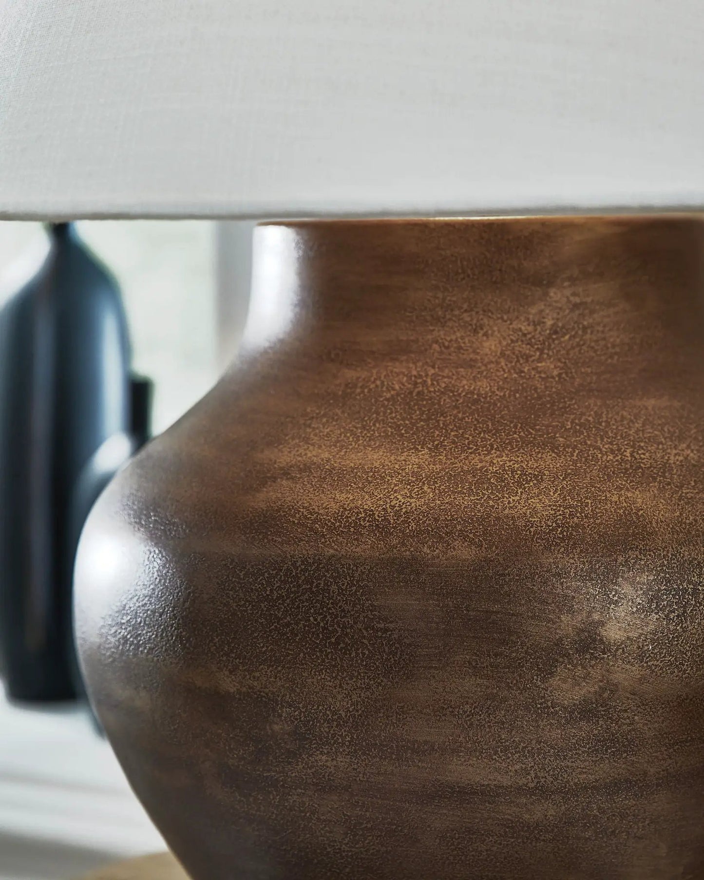 Whitham metal table lamp antique copper finish with brown textured base and white shade on Tampa Home & Garden Store