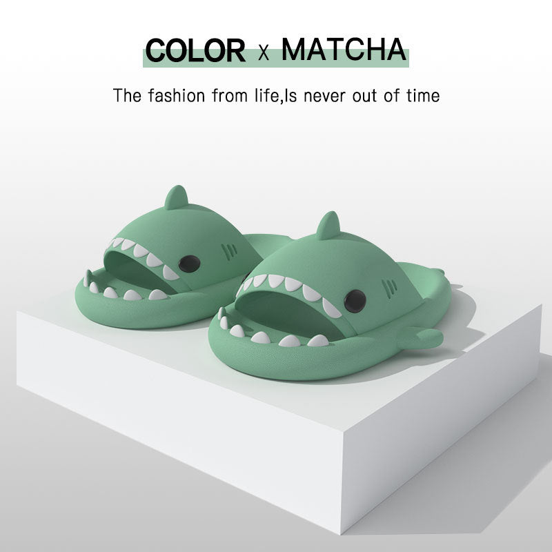 Shark-shaped green slippers by Stevvex, pair of open-toe slides with white teeth accents on Tampa Home & Garden Store