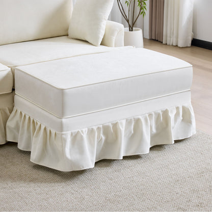 White L-shaped sectional sofa with removable ruffled skirt and ottoman, fabric upholstery on Tampa Home & Garden Store