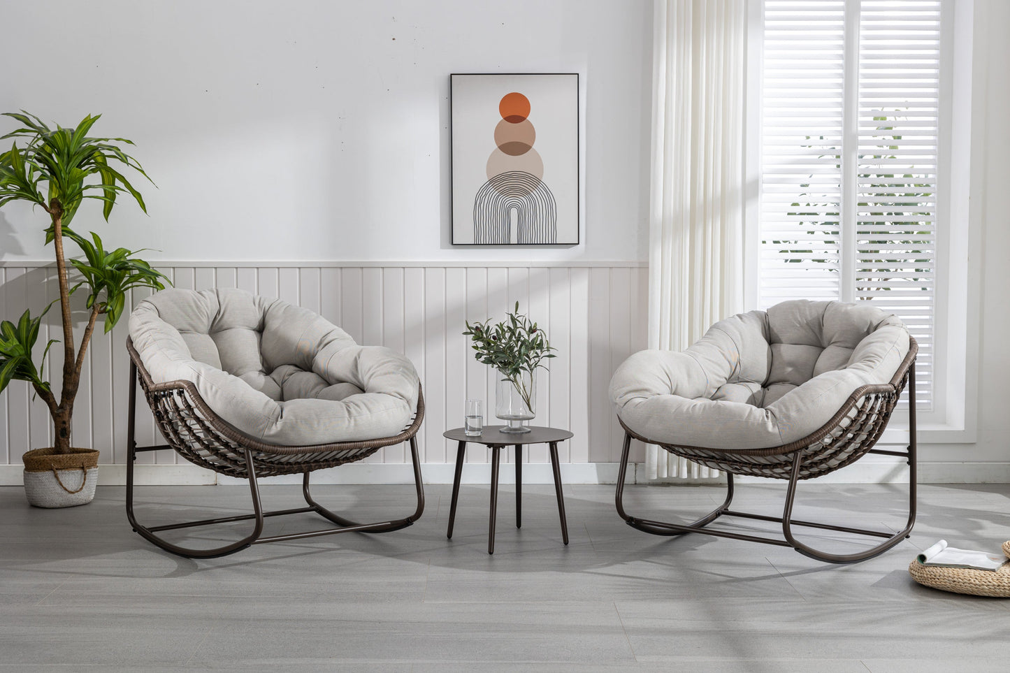 Pair of HouseOfZazla outdoor rattan rocking chairs with beige padded cushions on Tampa Home & Garden Store
