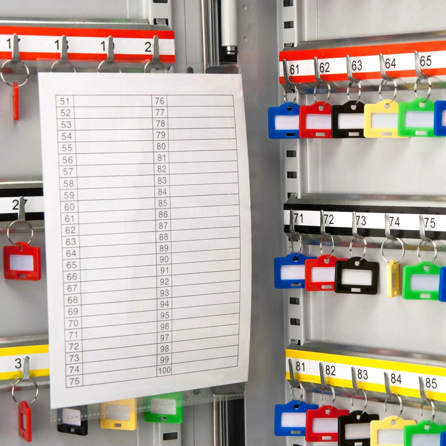 Adjustable key cabinet with lock; silver wall-mount organizer with color-coded key tags on Tampa Home & Garden Store