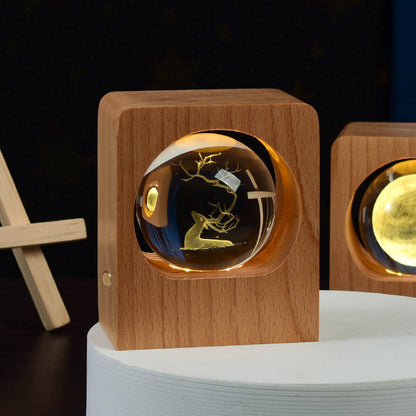 2 Beech crystal ball night lights with cube bases featuring 3D elk engraving and LED glow on Tampa Home & Garden Store