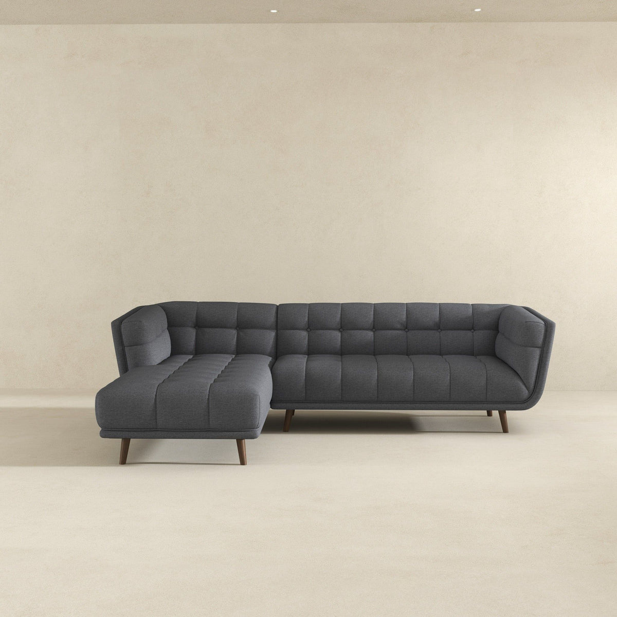 L-shaped tufted sectional sofa in dark gray fabric with mid-century design HouseOfZazla on Tampa Home & Garden Store