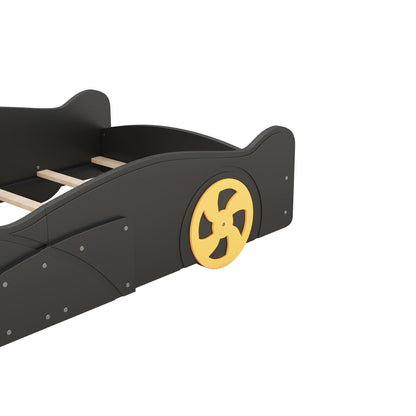 Race car shaped platform bed with black finish and yellow wheel accents by HouseOfZazla on Tampa Home & Garden Store