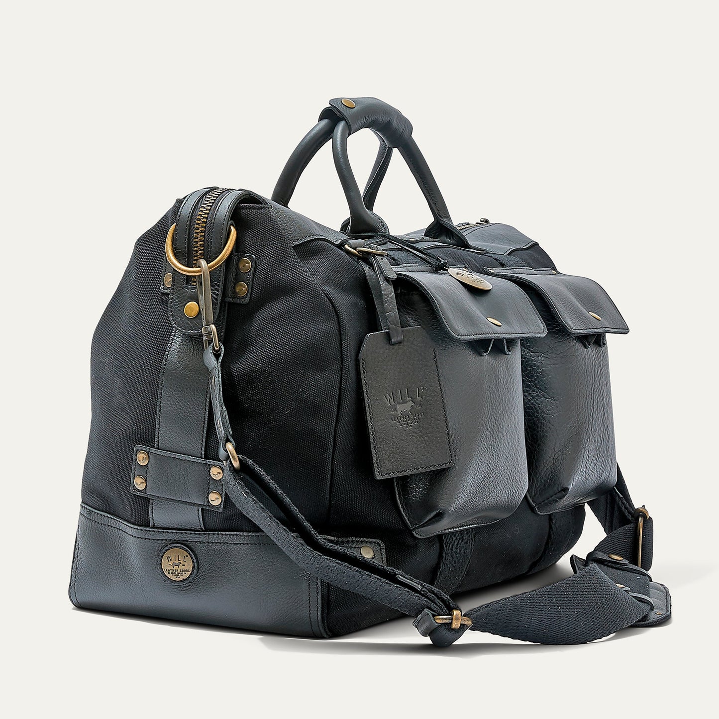 Will Leather Goods Canvas Travel Duffle in black with leather handles and brass hardware on Tampa Home & Garden Store