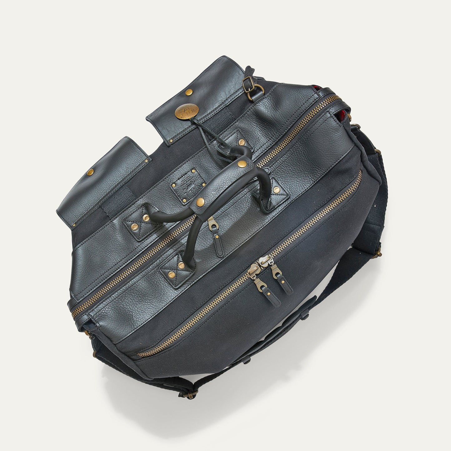 Canvas & Leather Travel Duffle bag by Will Leather Goods in dark navy with brass hardware on Tampa Home & Garden Store