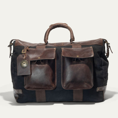 Canvas & Leather Travel Duffle by Will Leather Goods with brown leather trim and front pockets on Tampa Home & Garden Store