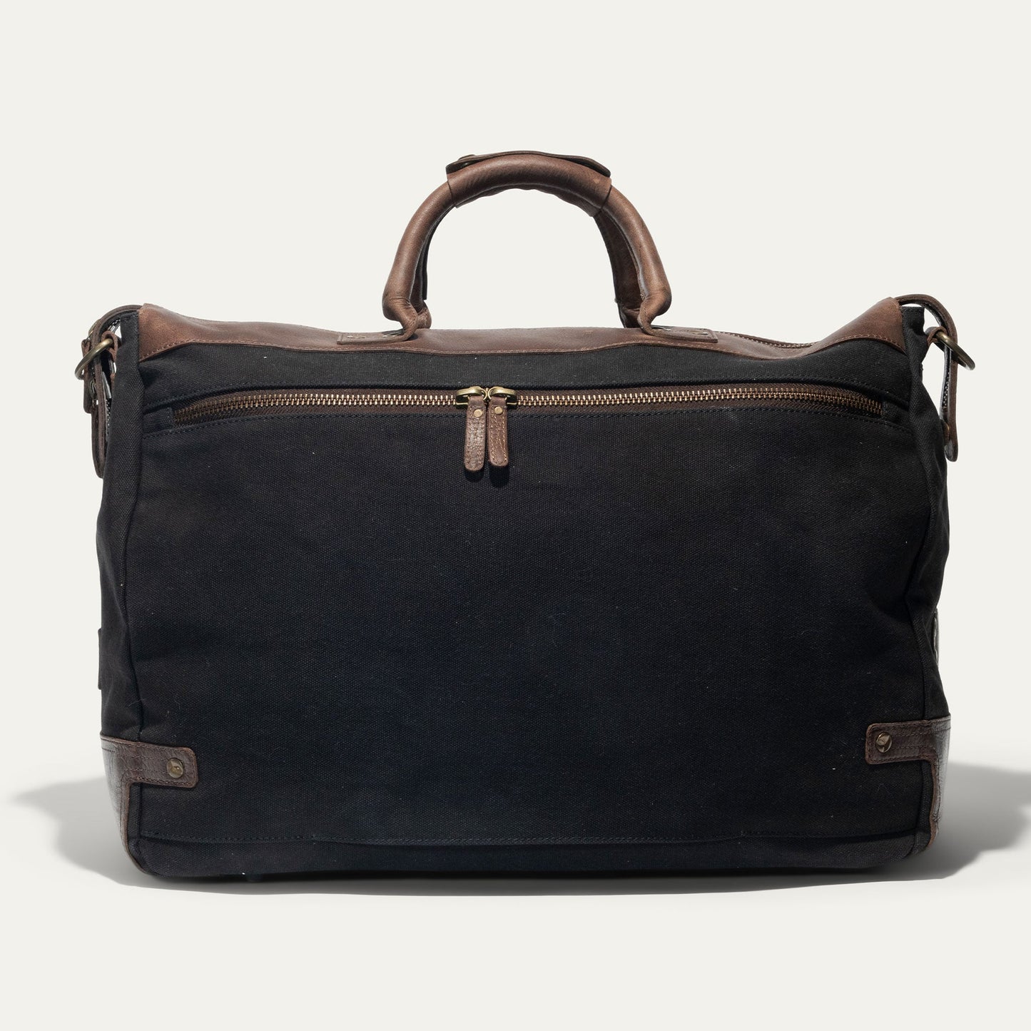Canvas & Leather Travel Duffle by Will Leather Goods with black canvas and brown leather handles on Tampa Home & Garden Store