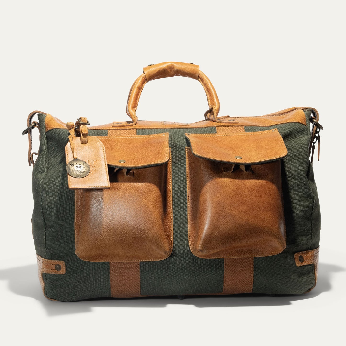 Canvas & Leather Travel Duffle by Will Leather Goods in green canvas with leather pockets on Tampa Home & Garden Store