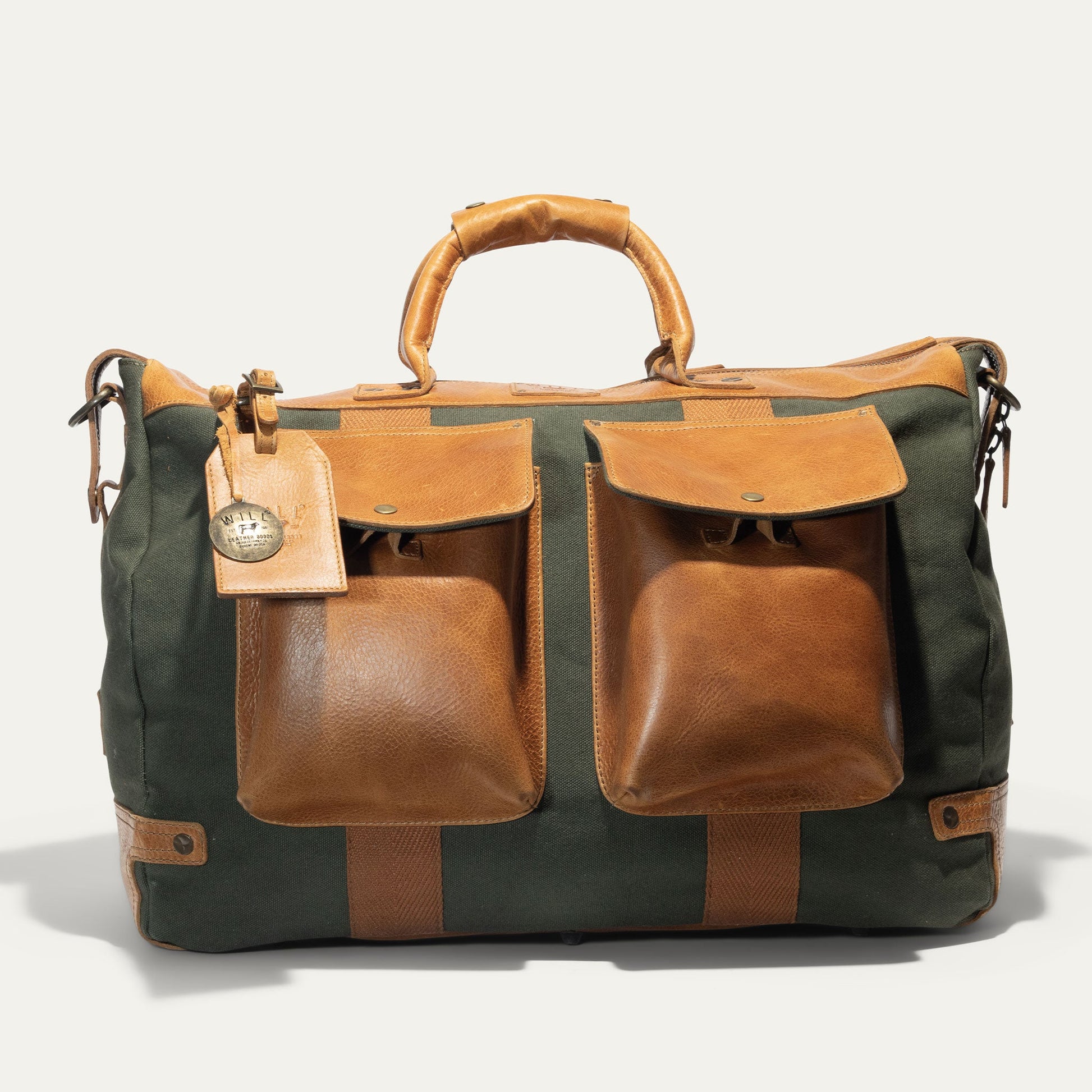 Canvas & Leather Travel Duffle by Will Leather Goods in green canvas with leather pockets on Tampa Home & Garden Store