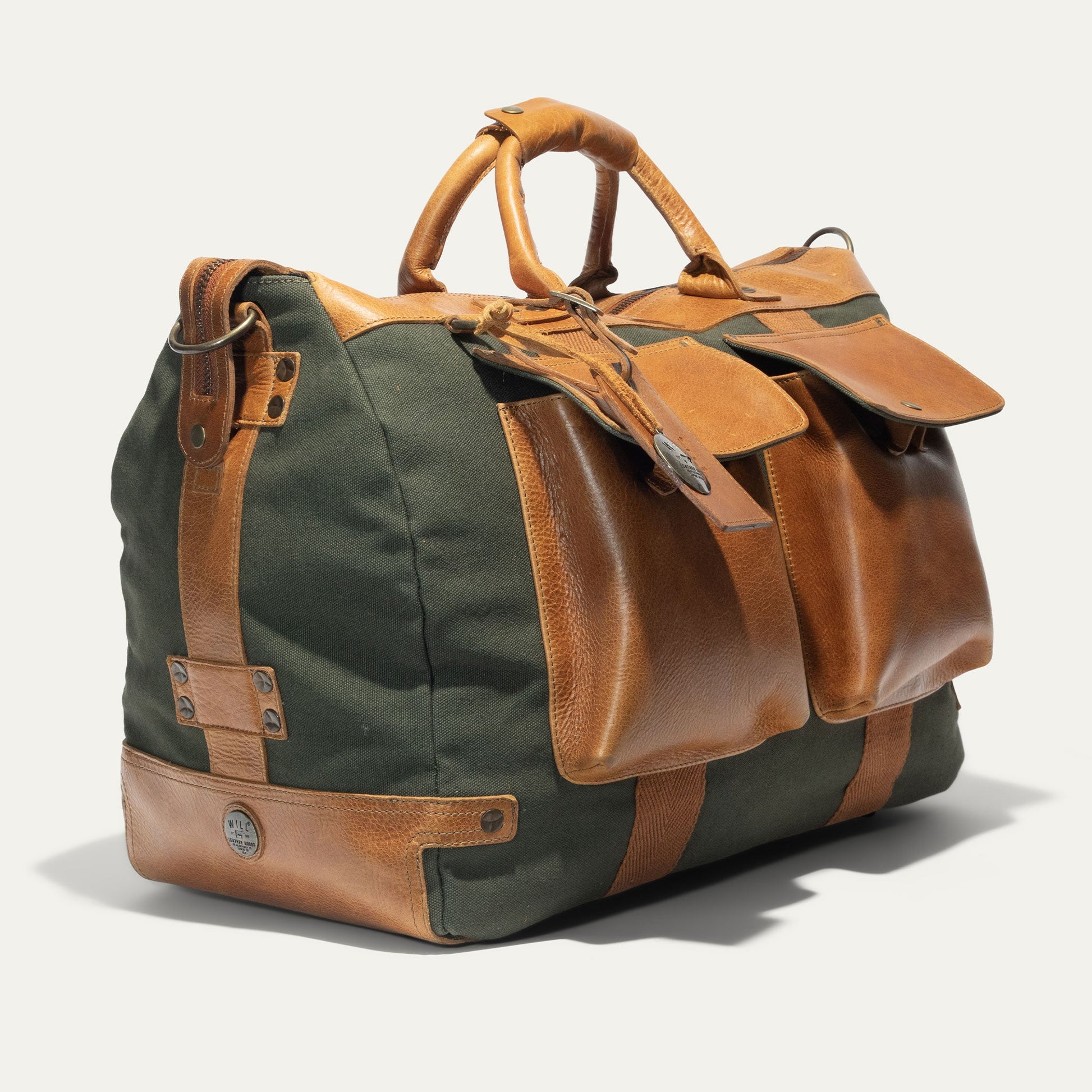 Will Leather Goods Canvas Travel Duffle; olive canvas with tan leather trim top handles on Tampa Home & Garden Store