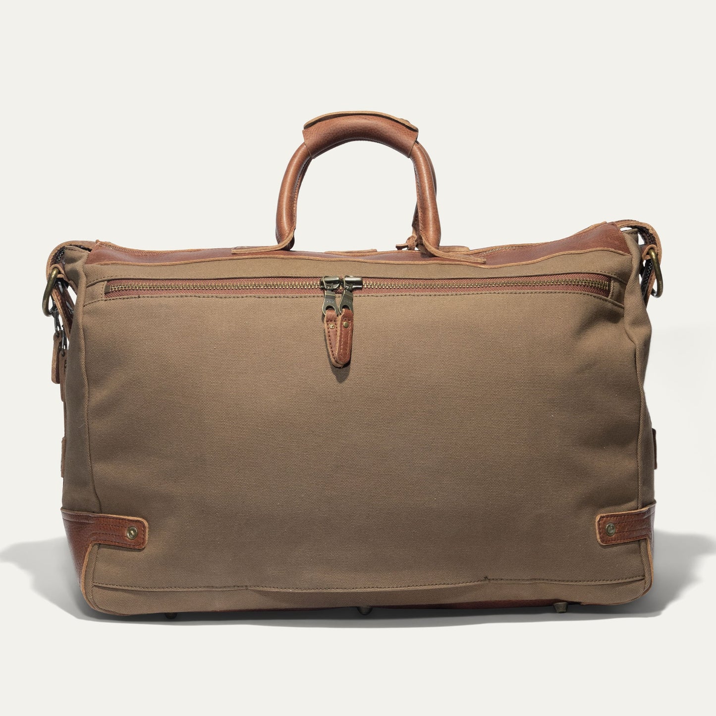 Canvas & Leather Travel Duffle with tan canvas and brown leather handles, zipper closure on Tampa Home & Garden Store