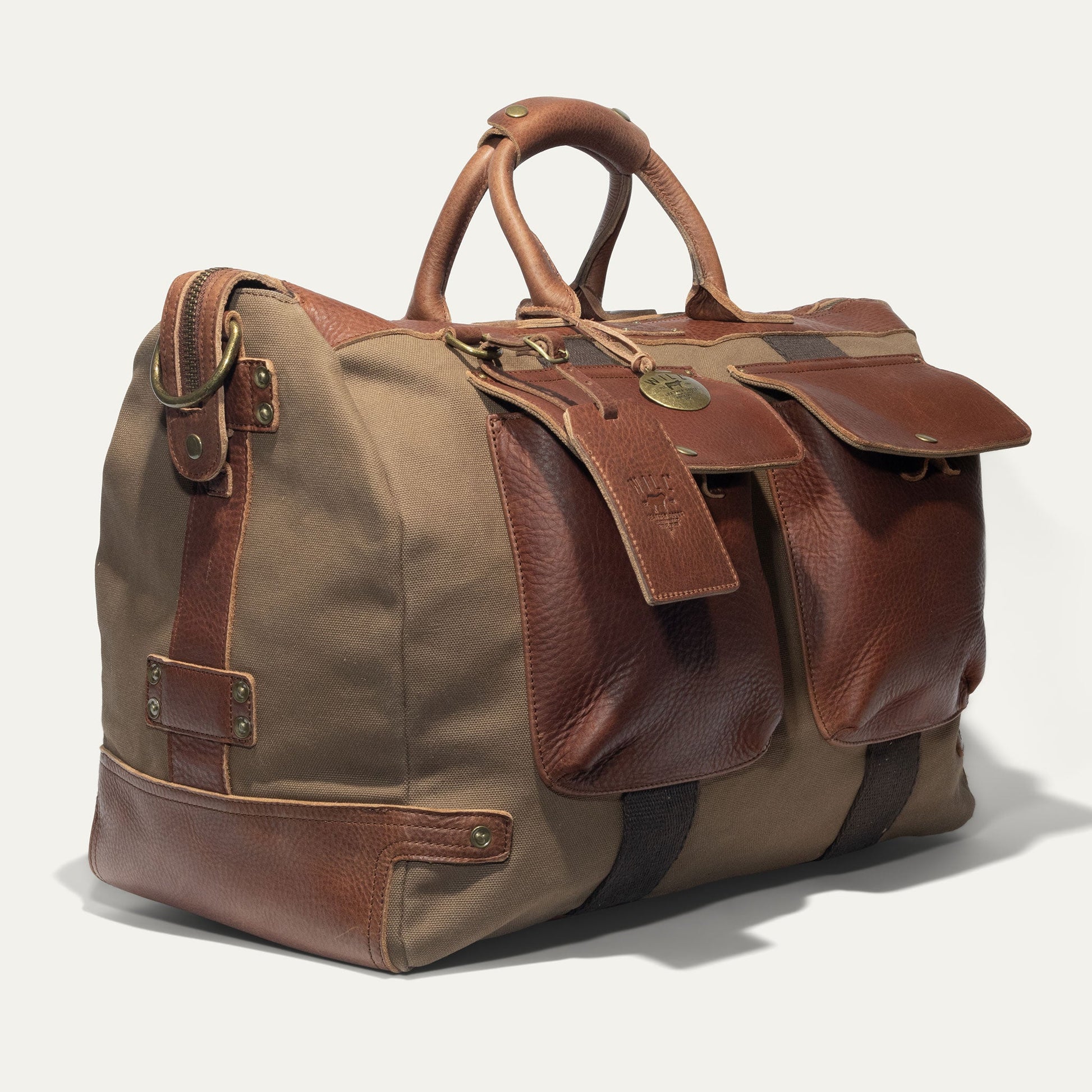 Canvas & Leather Travel Duffle by Will Leather Goods in tan canvas with leather trim on Tampa Home & Garden Store