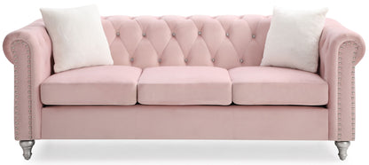 the Raisa Tufted Sofa and Nailhead Accents