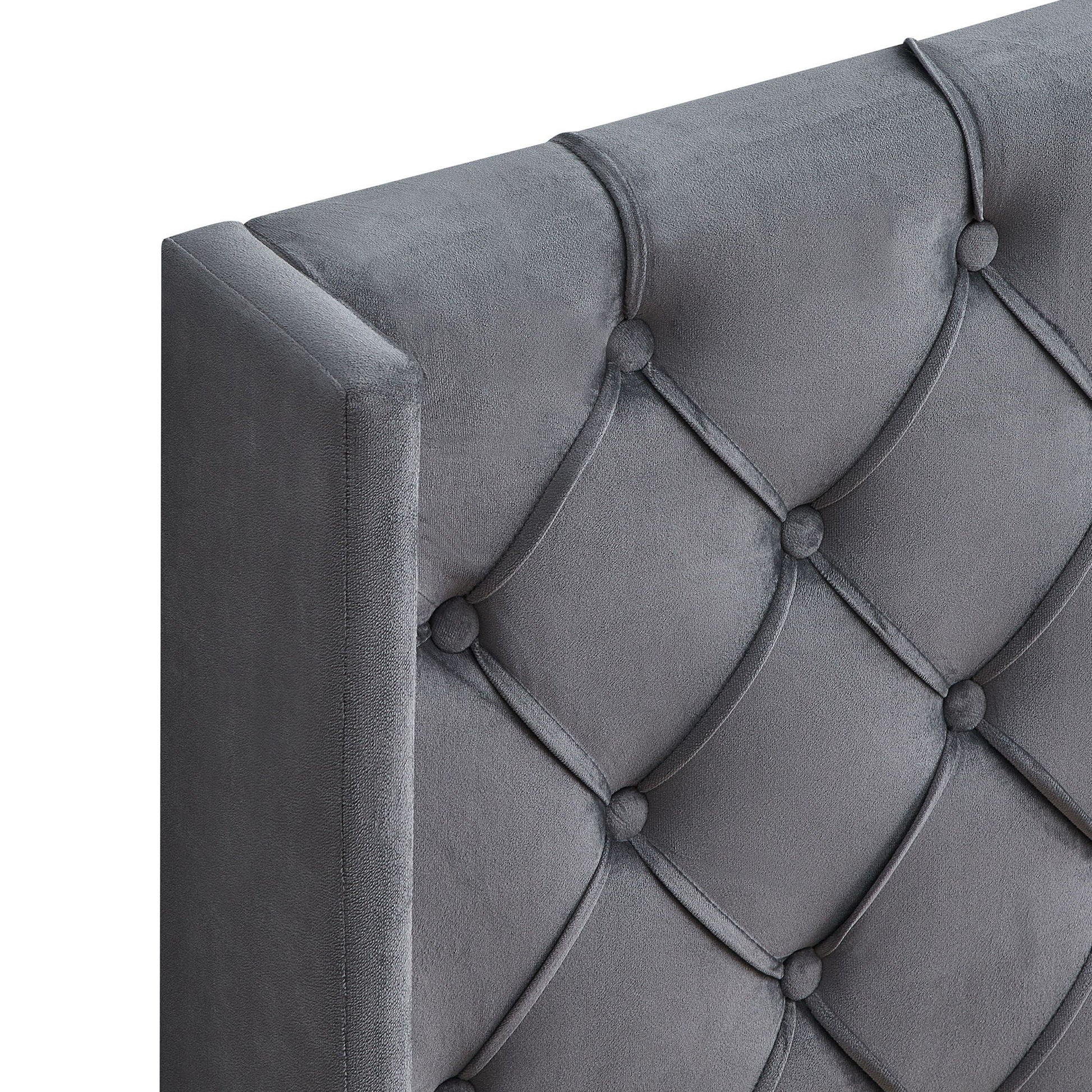 Gray velvet tufted bed with winged headboard, button accents, wood slat platform on Tampa Home & Garden Store