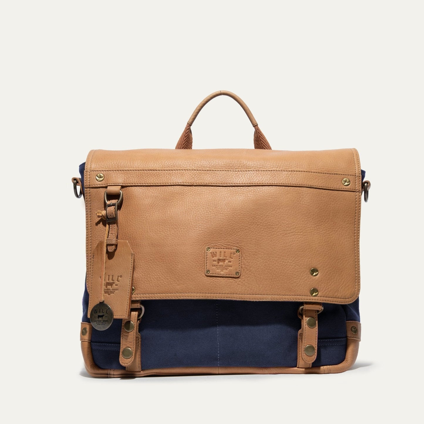 Wallace Messenger Bag in tan pebbled leather with navy canvas base by Will Leather Goods on Tampa Home & Garden Store