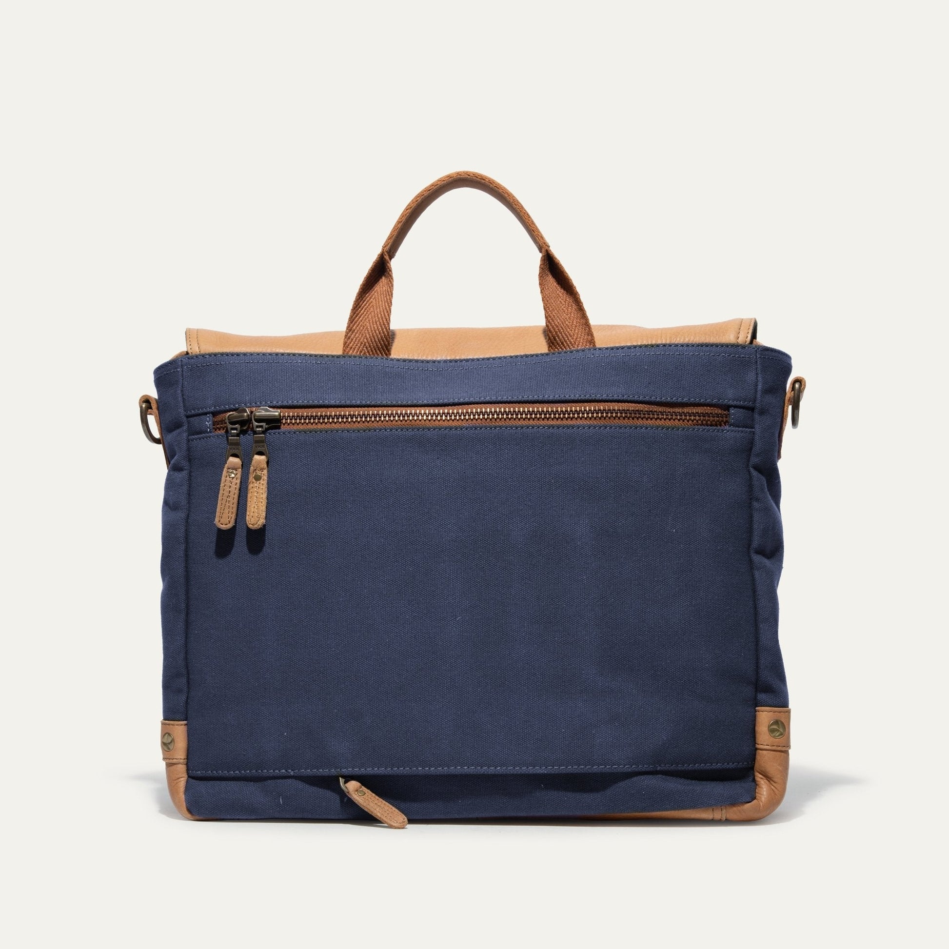 Wallace Messenger Bag by Will Leather Goods, navy canvas with tan leather accents and zipper details on Tampa Home & Garden Store