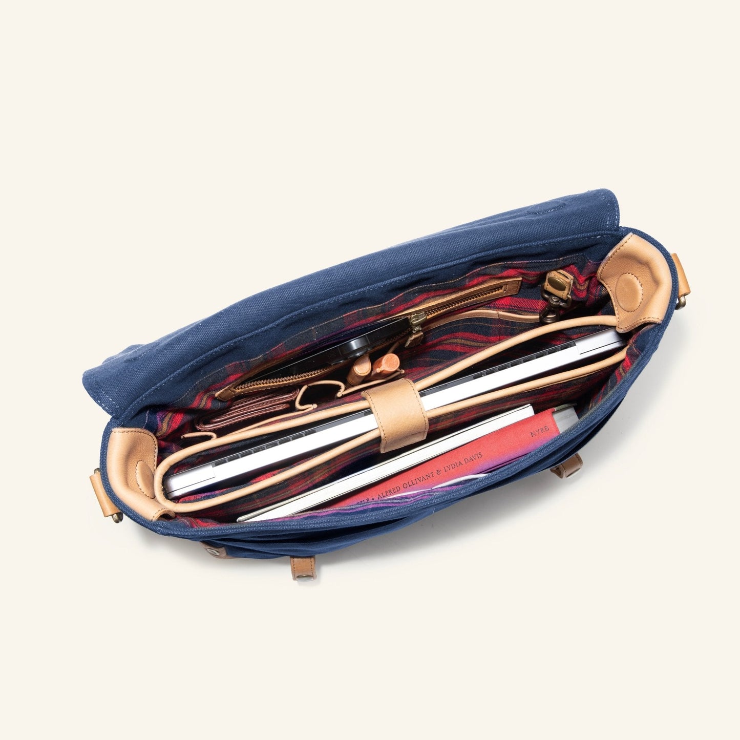 Wallace Messenger Bag by Will Leather Goods, navy denim exterior with tan leather trim on Tampa Home & Garden Store