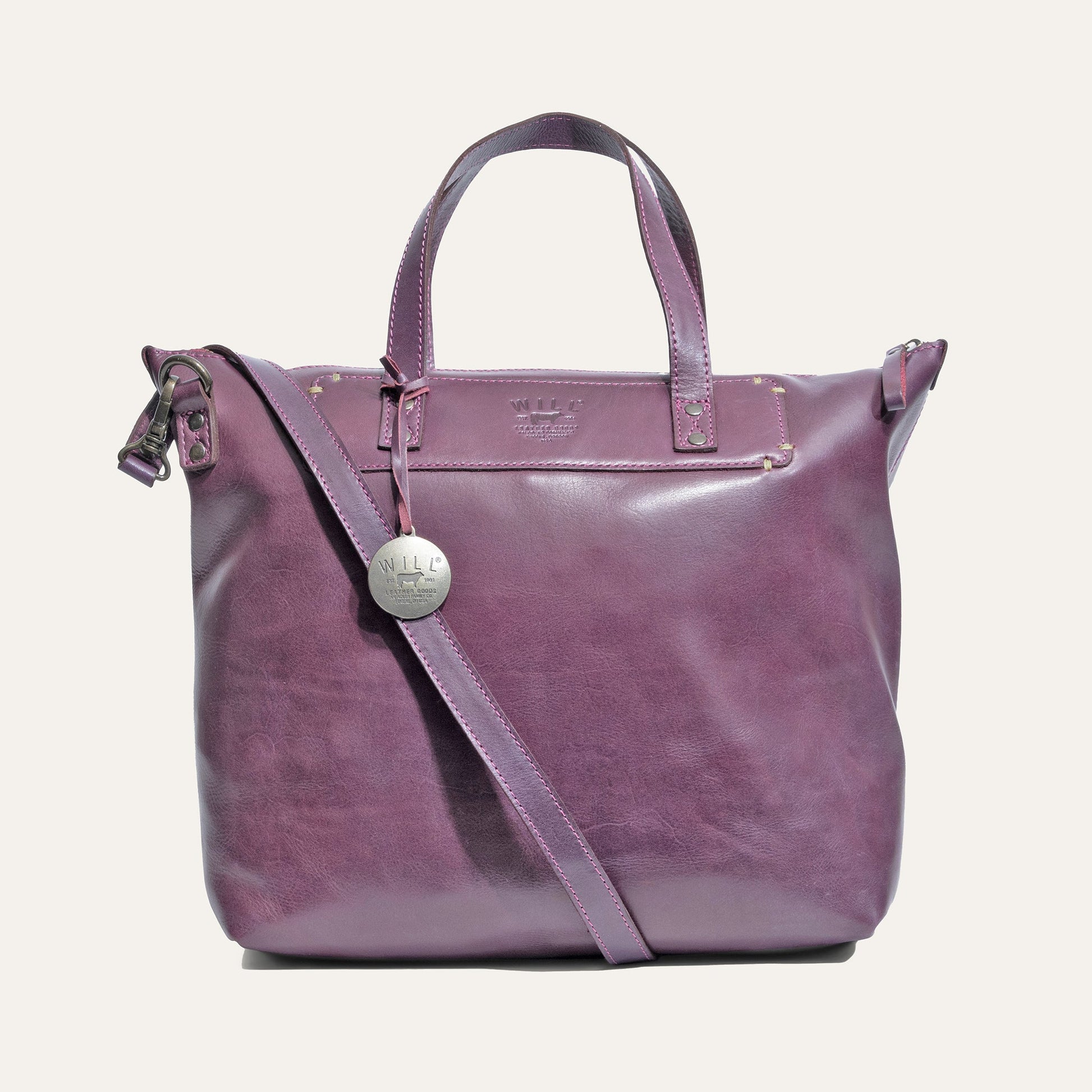 Simple Satchel by Will Leather Goods in purple leather with pink stitching and top handles on Tampa Home & Garden Store