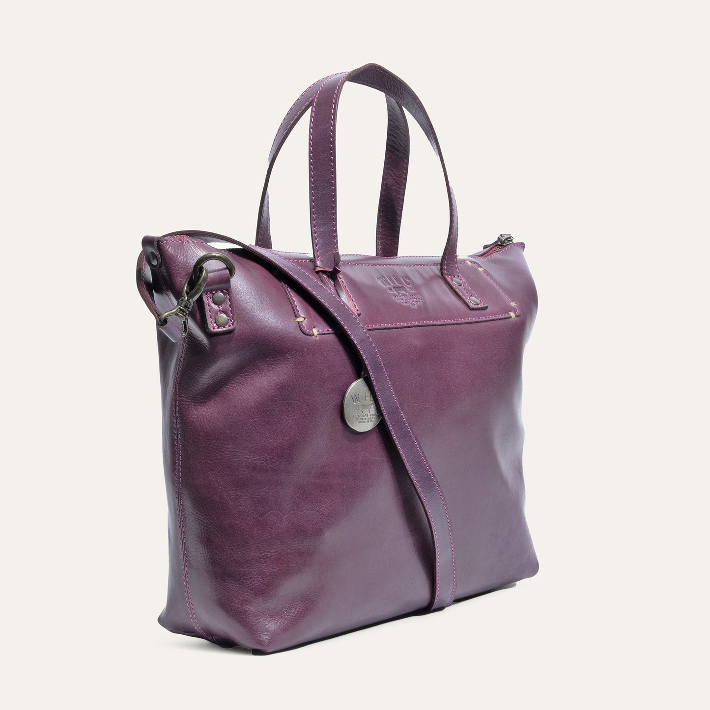Simple Satchel by Will Leather Goods in purple leather with pink stitching on Tampa Home & Garden Store