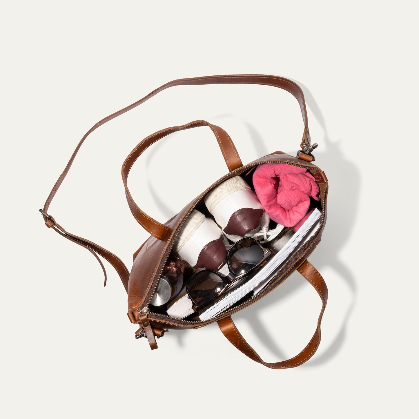Will Leather Goods Simple Satchel, brown leather bag with strap, pink scarf and sunglasses on Tampa Home & Garden Store