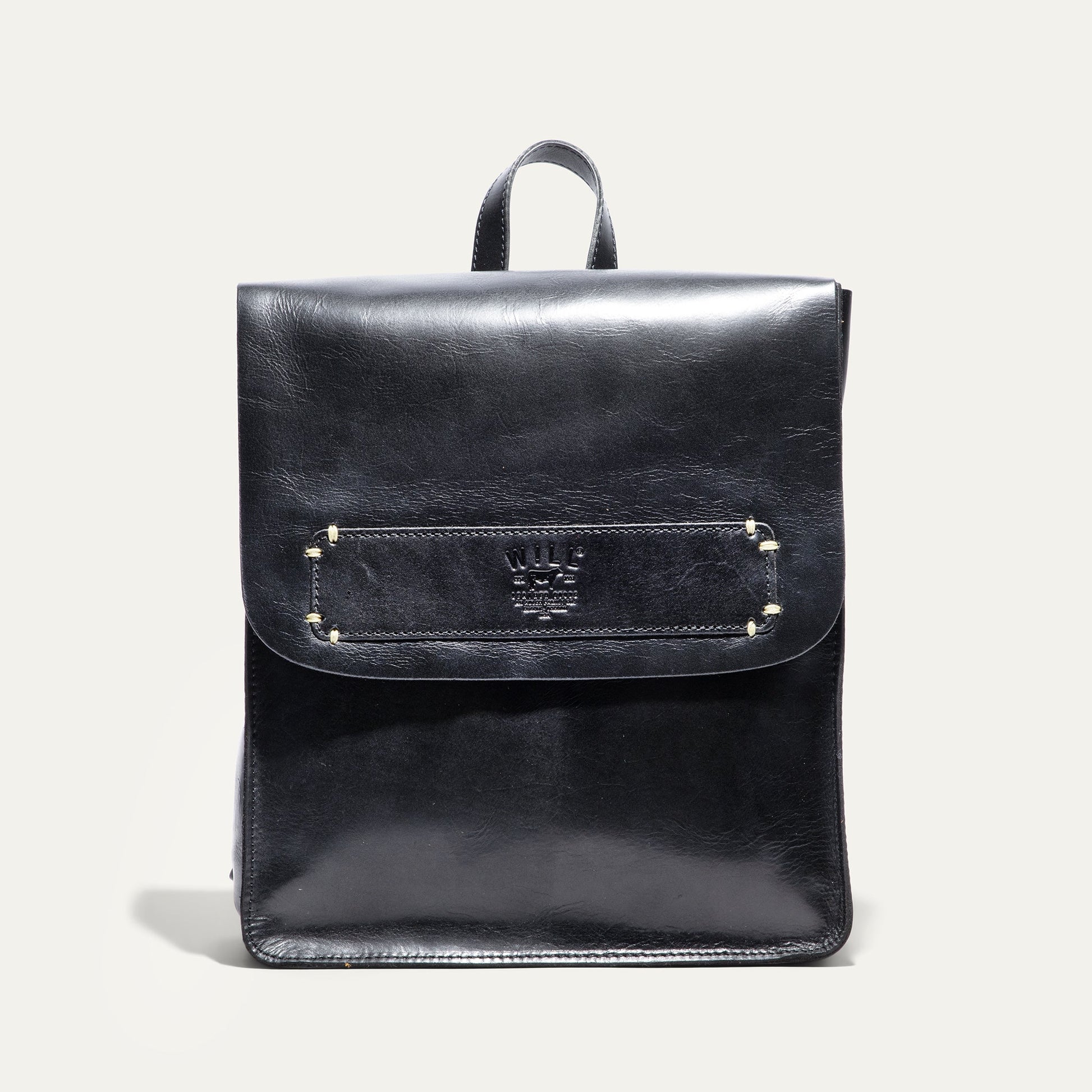 Simple Backpack by Will Leather Goods in black leather with top handle and stitched pocket on Tampa Home & Garden Store