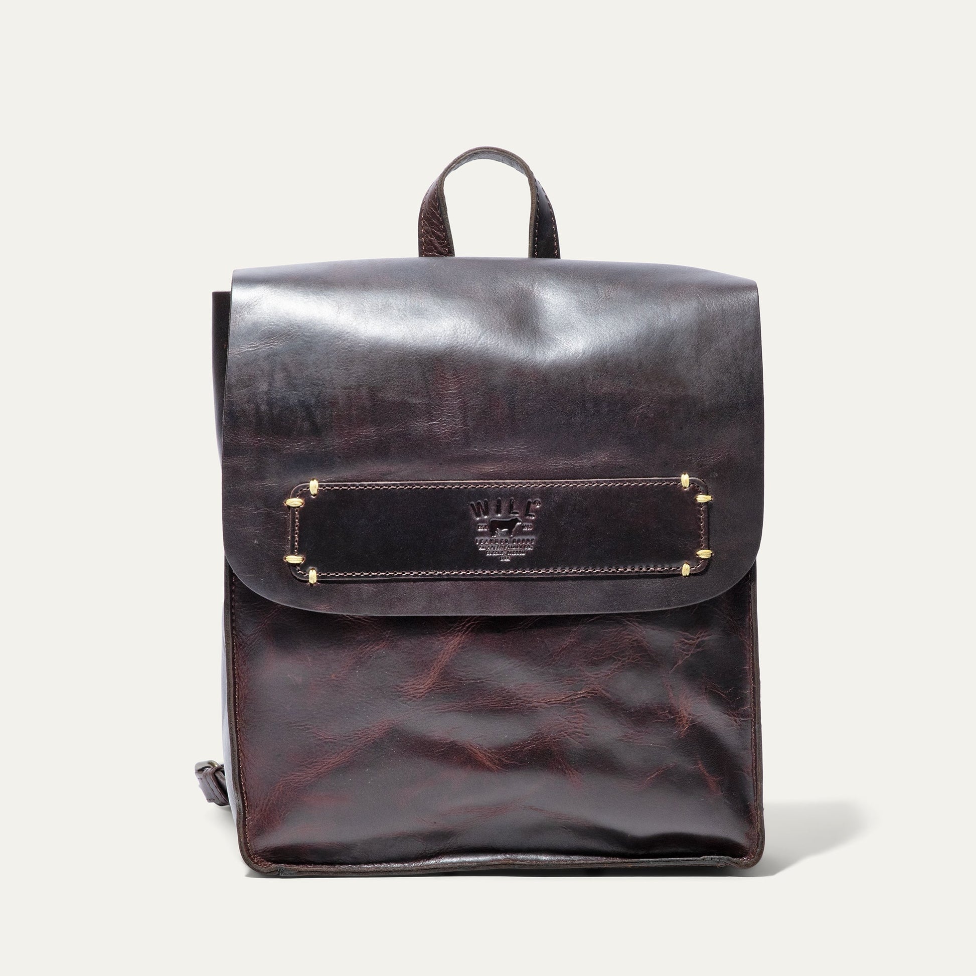 Will Leather Goods Simple Backpack dark brown leather with embossed logo and front pocket on Tampa Home & Garden Store
