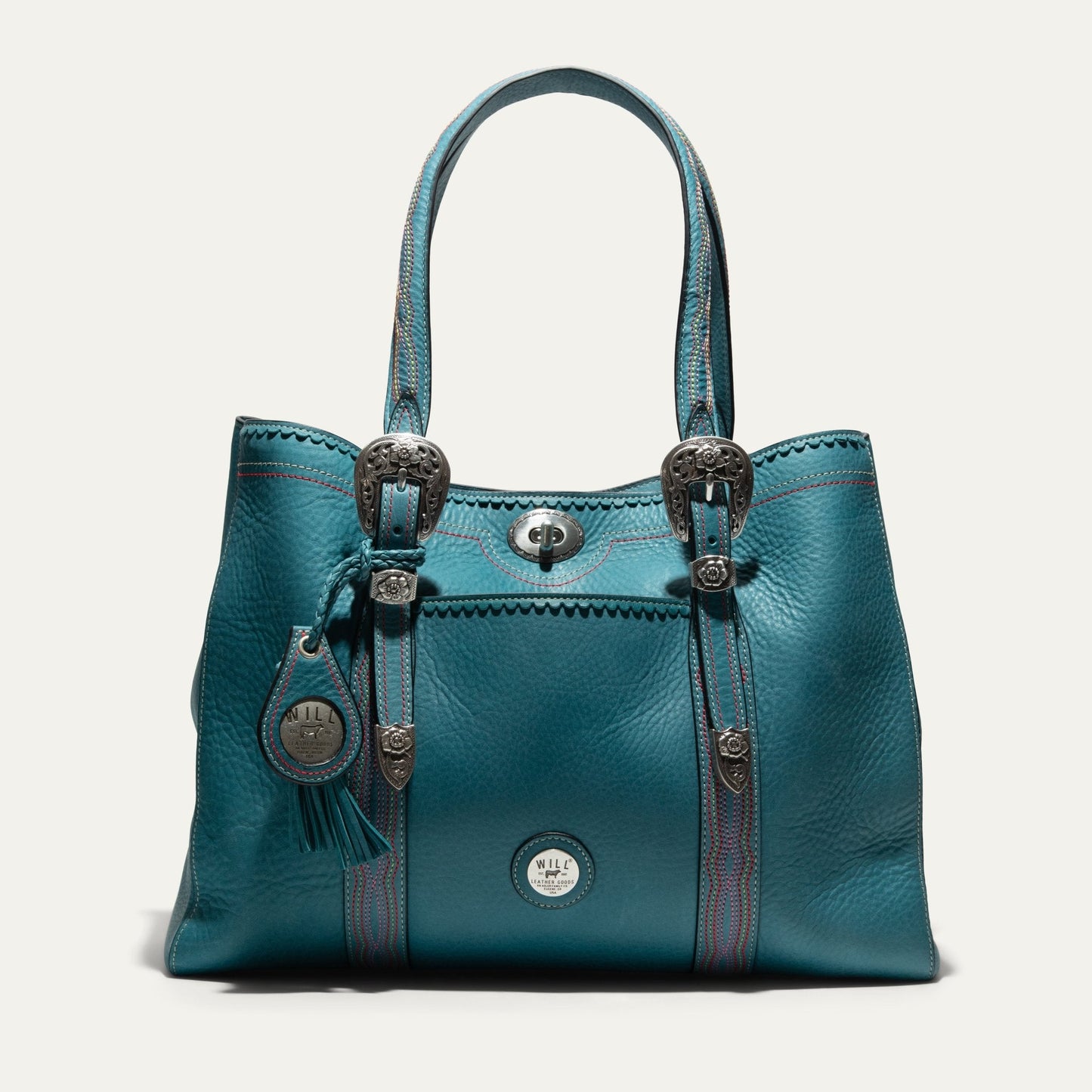 El Paso Work Tote Will Leather Goods teal tote with silver-tone hardware and tassels on Tampa Home & Garden Store