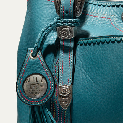 El Paso Work Tote by Will Leather Goods teal leather bag with braided strap and silver conchos on Tampa Home & Garden Store