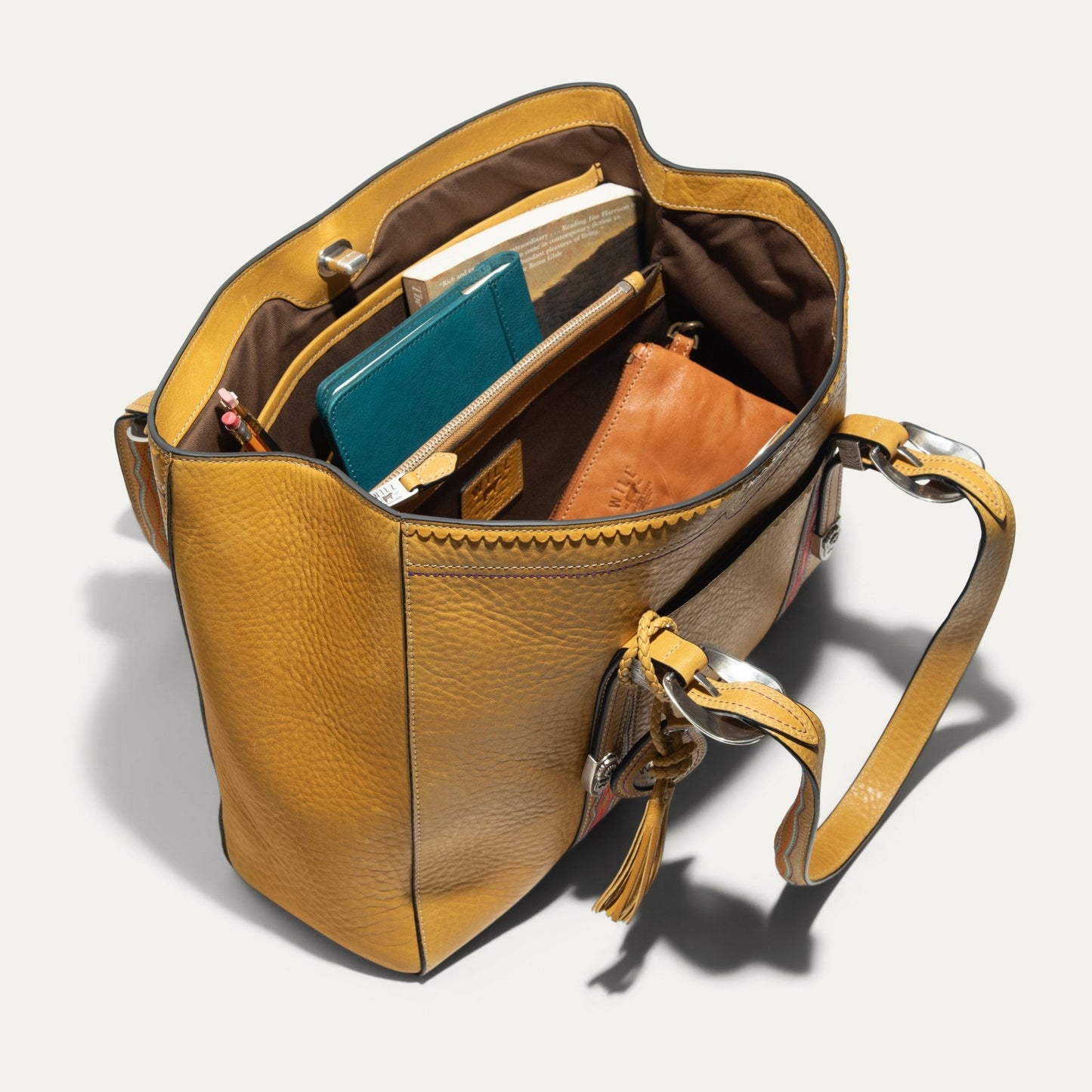 El Paso Work Tote by Will Leather Goods, tan leather bag with brown interior and teal notebook inside on Tampa Home & Garden Store