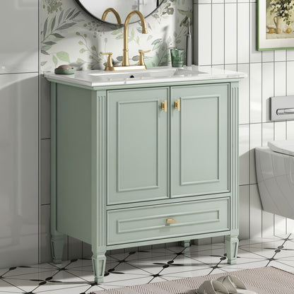 Freestanding vanity with drawer and soft-close doors in seafoam green with gold hardware on Tampa Home & Garden Store