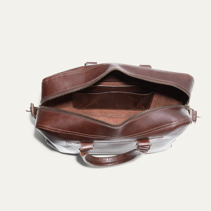 The Field Briefcase by Will Leather Goods, brown leather with white stitching and open zipper on Tampa Home & Garden Store