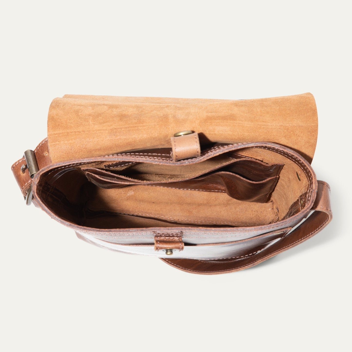 The Field Crossbody bag by Will Leather Goods, tan suede flap on brown leather, adjustable strap on Tampa Home & Garden Store