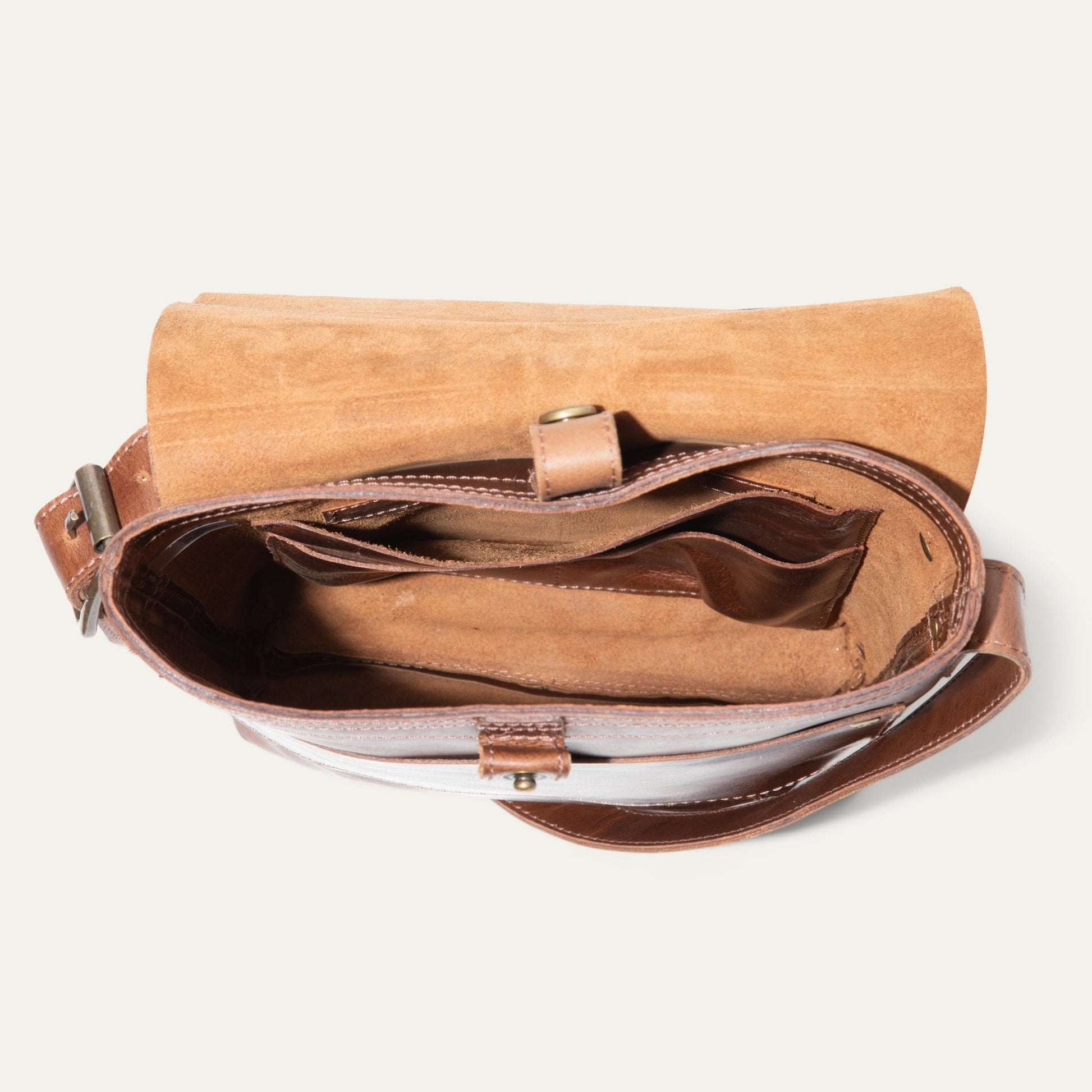The Field Crossbody bag by Will Leather Goods, tan suede flap on brown leather, adjustable strap on Tampa Home & Garden Store