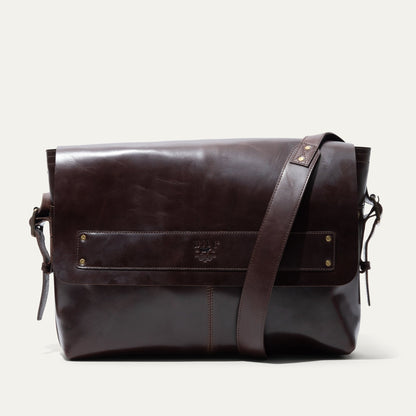 The Field Messenger bag by Will Leather Goods, dark brown leather with brass hardware on Tampa Home & Garden Store