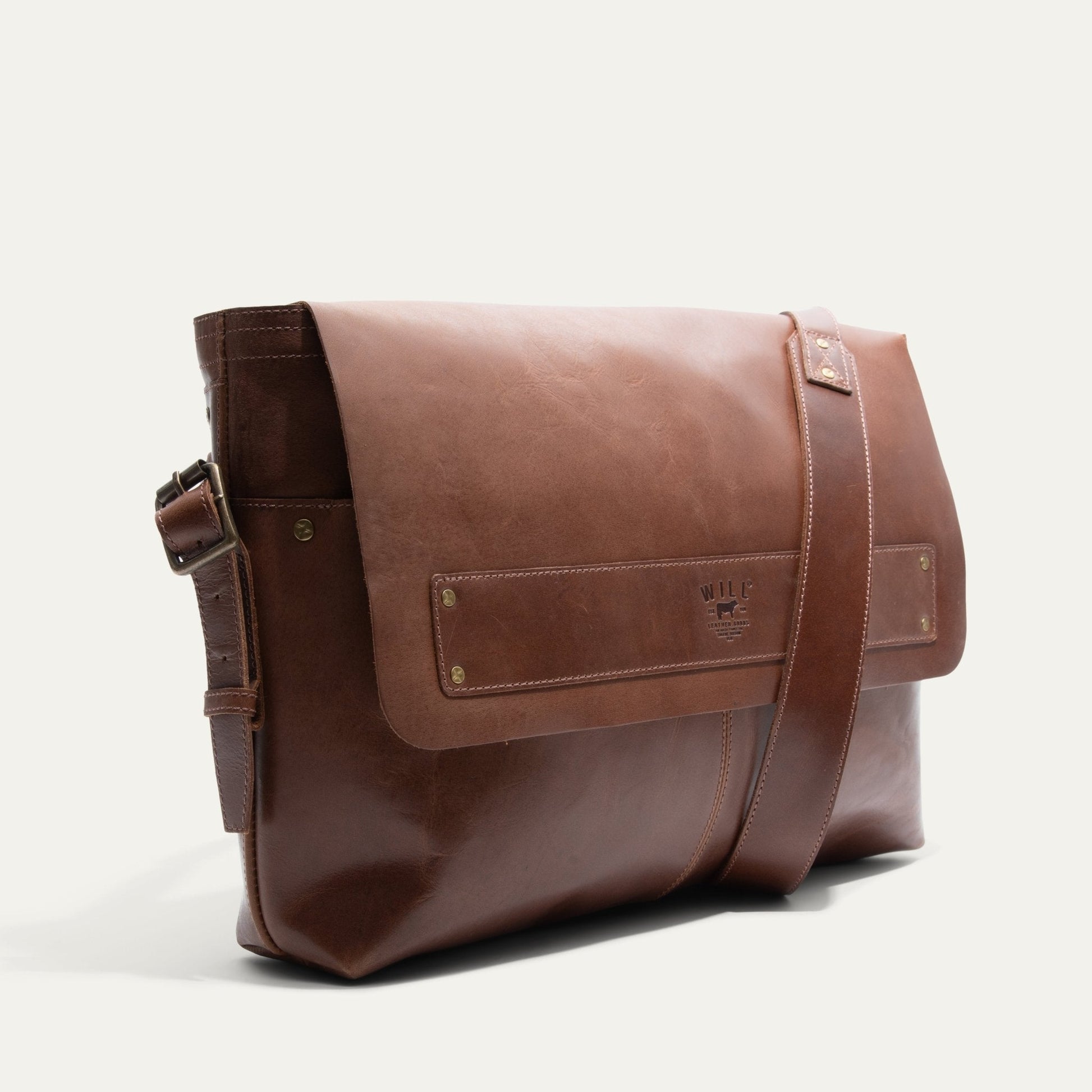 Will Leather Goods Field Messenger bag in brown leather with brass rivets and front pocket on Tampa Home & Garden Store