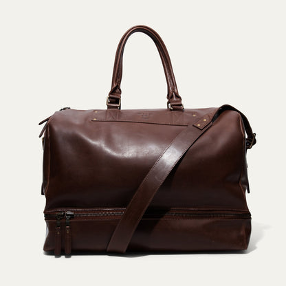 The Field Duffle by Will Leather Goods brown leather duffel bag with top handles and strap on Tampa Home & Garden Store