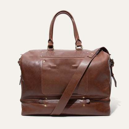 The Field Duffle by Will Leather Goods brown leather duffle with handles and brass hardware on Tampa Home & Garden Store