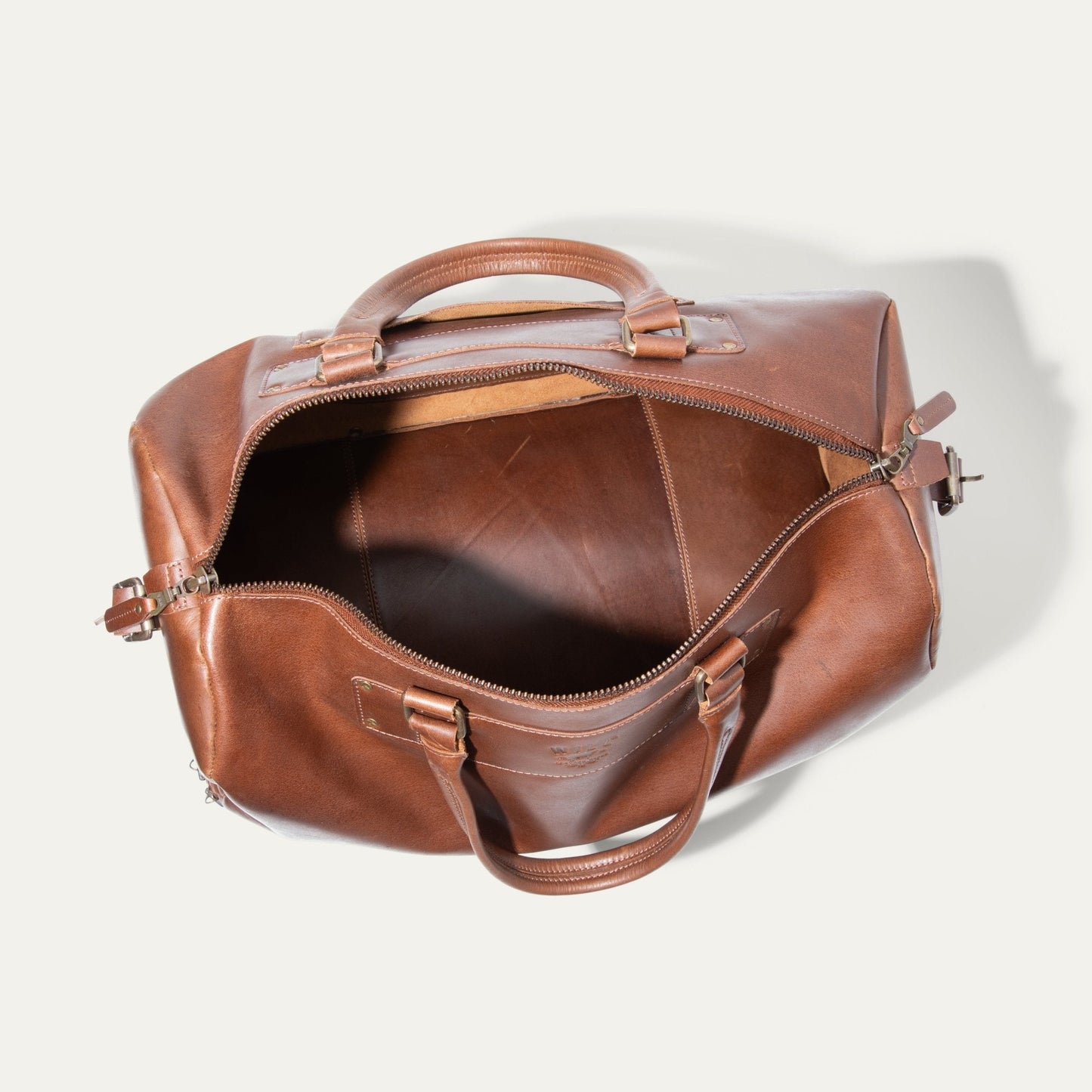 The Field Duffle by Will Leather Goods brown leather duffel with top handles on Tampa Home & Garden Store