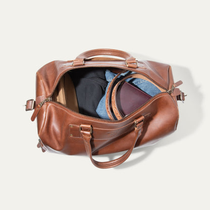 The Field Duffle by Will Leather Goods brown leather duffel with zipper and denim interior on Tampa Home & Garden Store