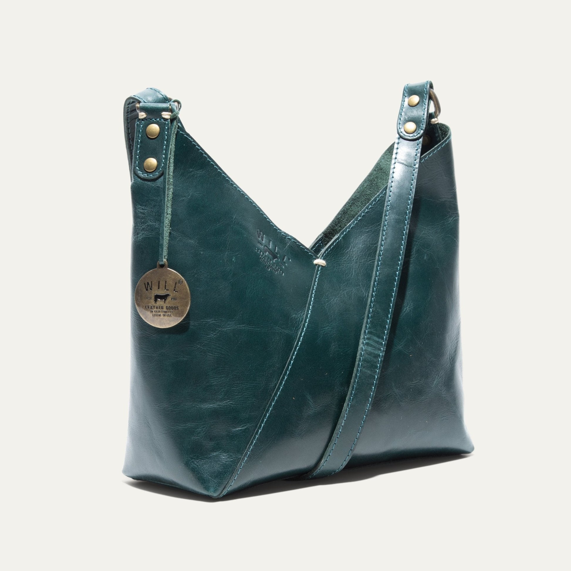 Simple Mini V Hobo bag in teal leather with brass hardware by Will Leather Goods on Tampa Home & Garden Store