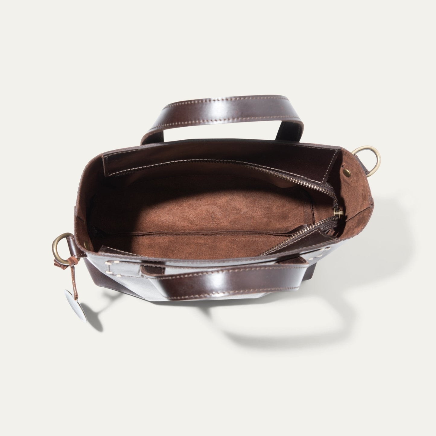 Simple Mini Satchel bag in dark brown leather with top handle and brass hardware on Tampa Home & Garden Store