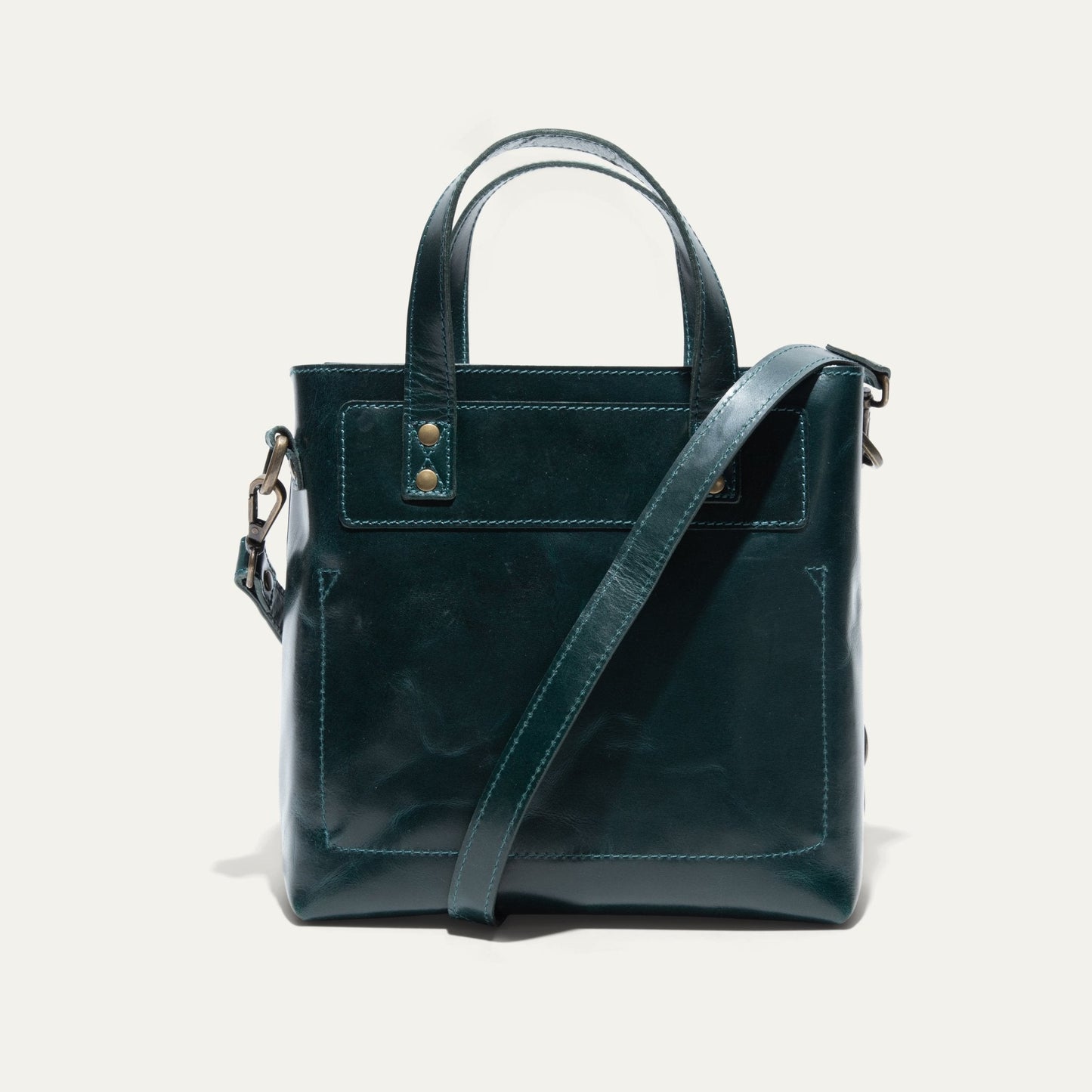 Will Leather Goods Simple Mini Satchel in dark teal leather with top handles and crossbody strap on Tampa Home & Garden Store