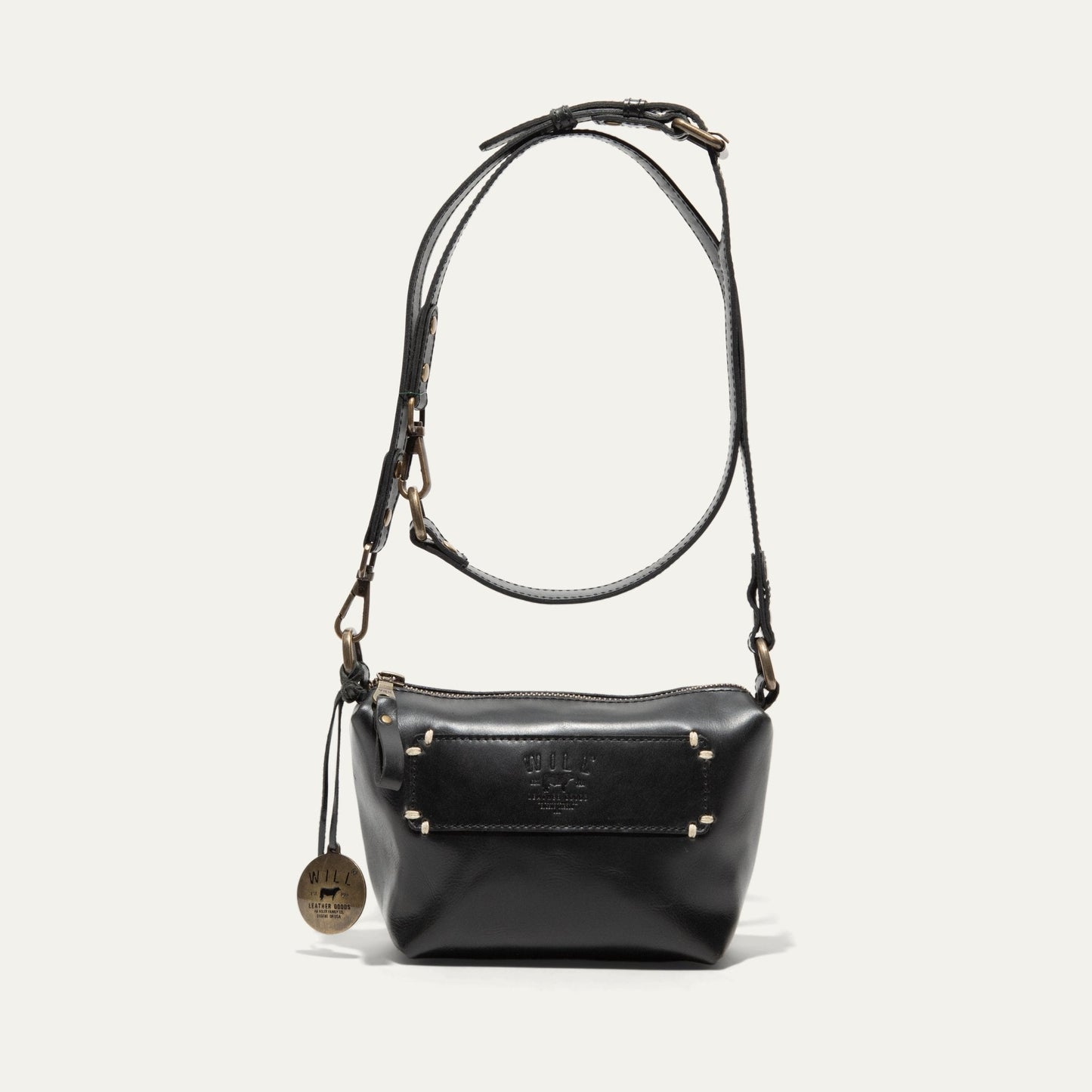 Simple Mini Pouch shoulder bag in black leather with brass hardware by Will Leather Goods on Tampa Home & Garden Store