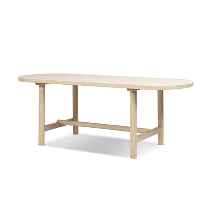 8-seat oval dining table in natural reclaimed pine with sturdy legs on Tampa Home & Garden Store