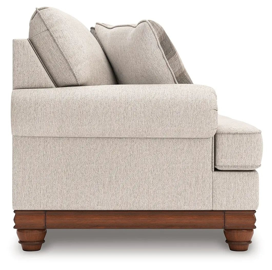 Clearbrooke sandstone sofa by Unique Piece Furniture; stationary beige textured fabric with wood base and bun feet on Tampa Home & Garden Store