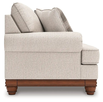 Clearbrooke sandstone sofa by Unique Piece Furniture; stationary beige textured fabric with wood base and bun feet on Tampa Home & Garden Store